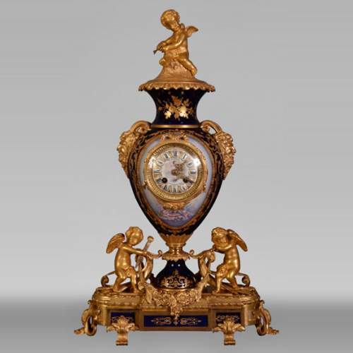 Napoleon III style clock, in Sèvres night blue porcelain and gilded bronze