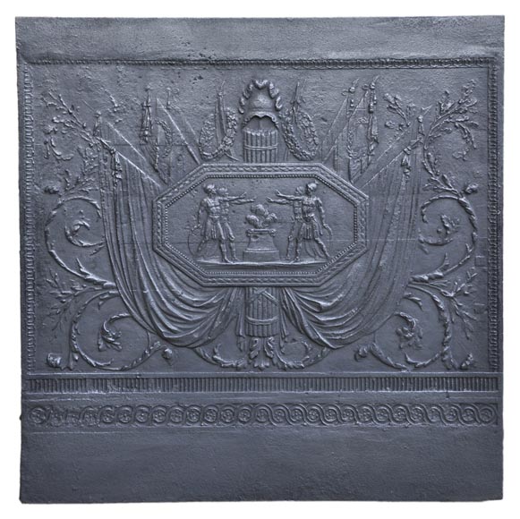 Antique large cast iron fireback inspired by 