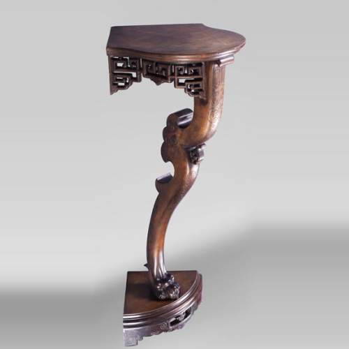 An antique Japanese style corner console