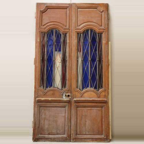 Wood door from the 18th century with 19th century iron openings