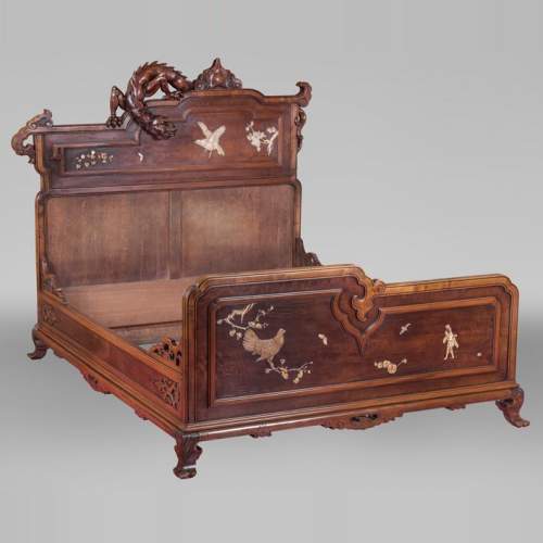 Antique bed of Far Eastern inspiration with engraved and inlaid bone decoration