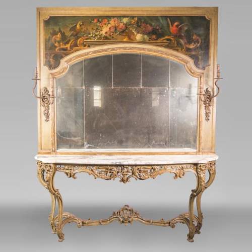 An antique console and its mirror, in Louis XV style, with parrots