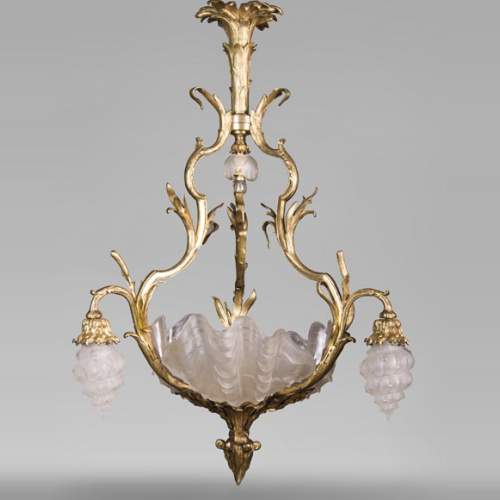 Antique chandelier in the Regency style with shells
