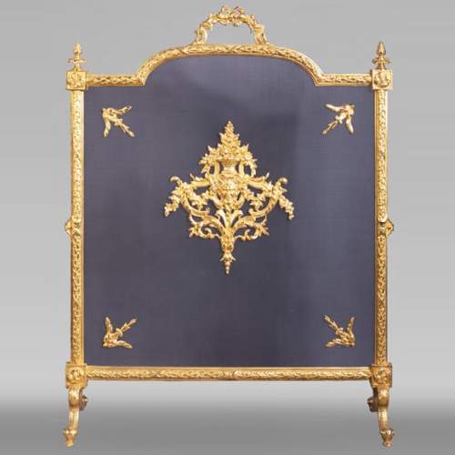 Fire screen in gilt bronze with Satyr mask