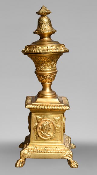 Pair of Louis XIV style gilt-bronze chenets decorated with profiles.-1