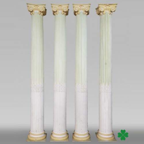 Set of four Ionic columns in painted plaster