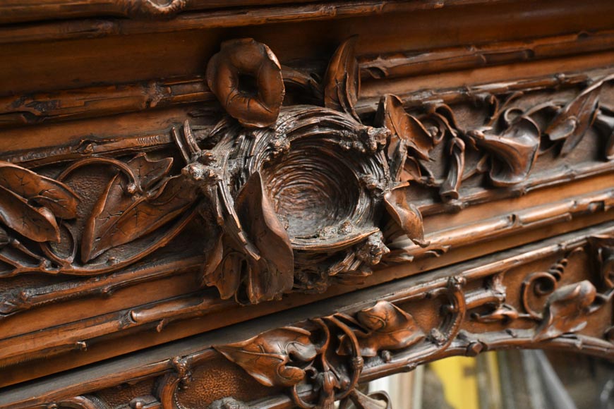TAHAN (attributed to) — Large carved walnut armoire with mirror and naturalist decoration-3