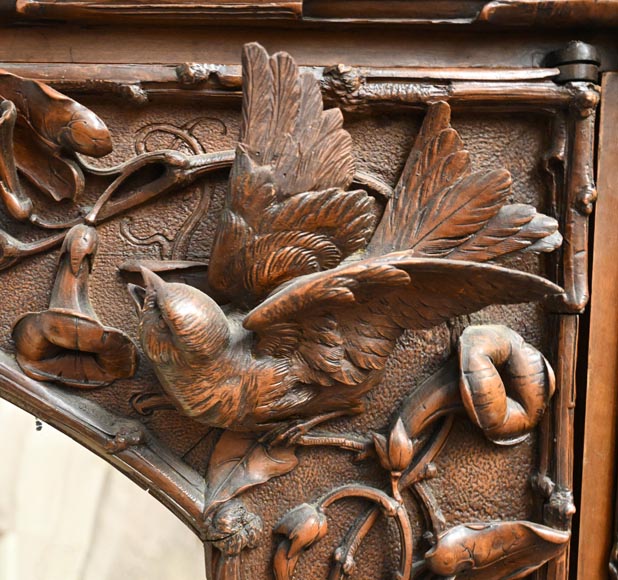 TAHAN (attributed to) — Large carved walnut armoire with mirror and naturalist decoration-6