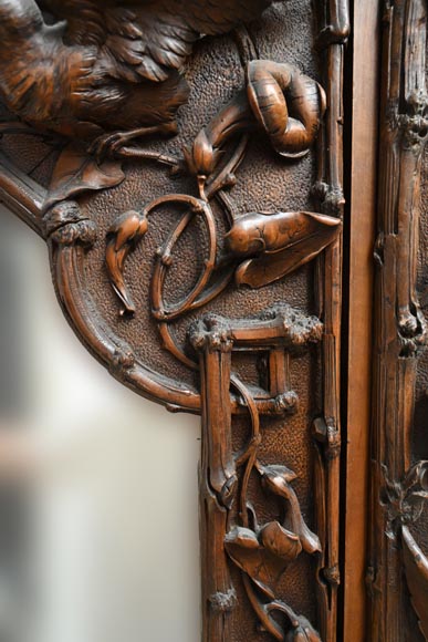 TAHAN (attributed to) — Large carved walnut armoire with mirror and naturalist decoration-7