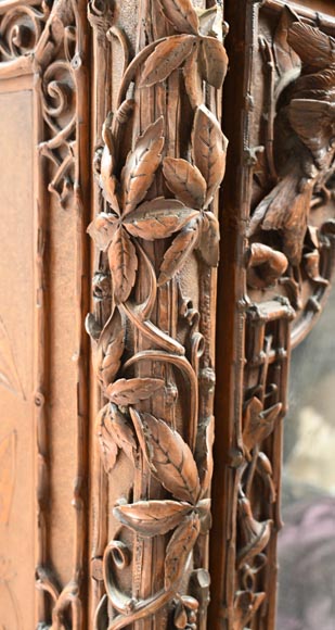 TAHAN (attributed to) — Large carved walnut armoire with mirror and naturalist decoration-15