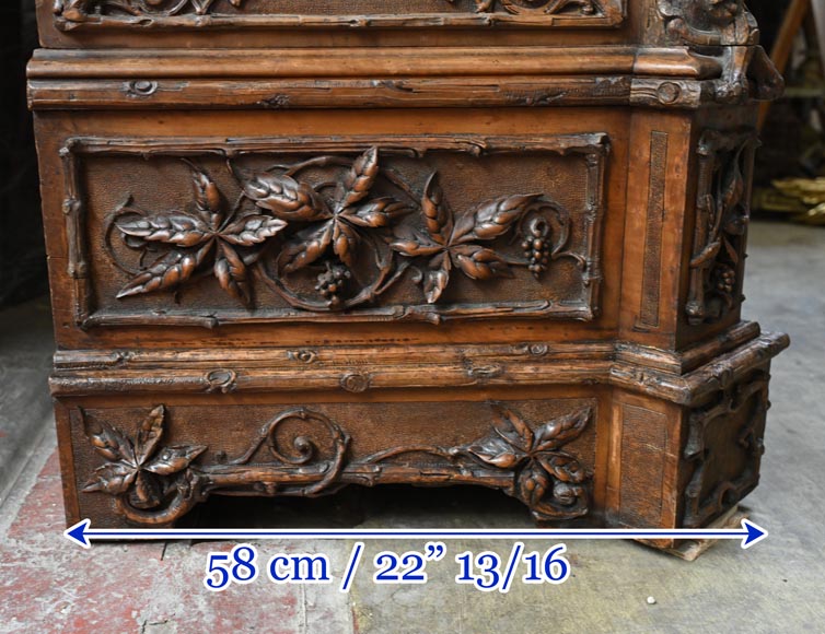 TAHAN (attributed to) — Large carved walnut armoire with mirror and naturalist decoration-18