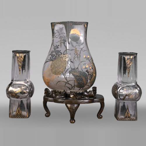 The Escalier de Cristal, a baluster vase on a bronze stand and a pair of bamboo vases in Japonesque crystal