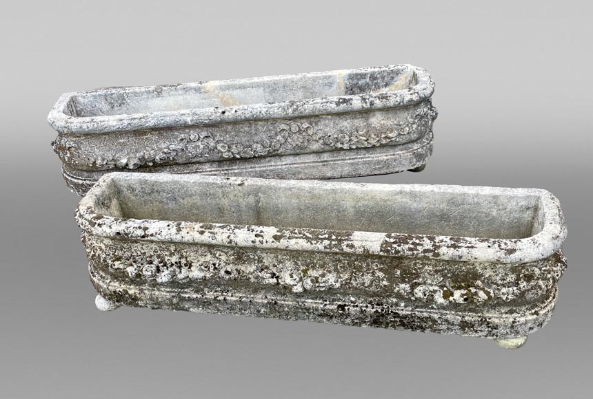 Pair of rectangular stone planters, decorated with floral scrollwork. Pair of rectangular stone planters, decorated with floral scrollwork.-0