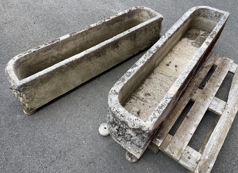Pair of rectangular stone planters, decorated with floral scrollwork. Pair of rectangular stone planters, decorated with floral scrollwork.-1
