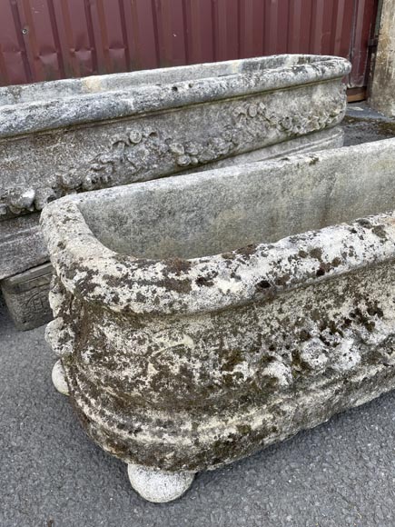 Pair of rectangular stone planters, decorated with floral scrollwork. Pair of rectangular stone planters, decorated with floral scrollwork.-4
