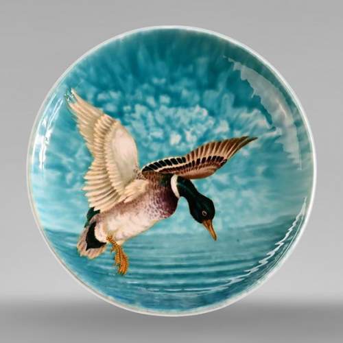 Théodore DECK (1823-1891), Earthenware dish with a flying mallard