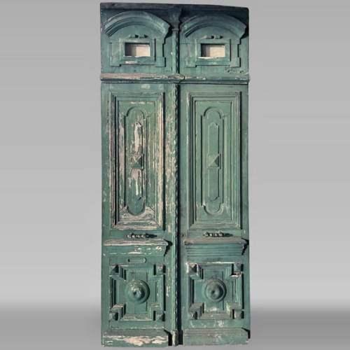  Large double door in wood painted in green and pediment, 20th century