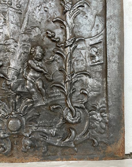 Antique fireback décorated with putti and a cannon, 19th century-5