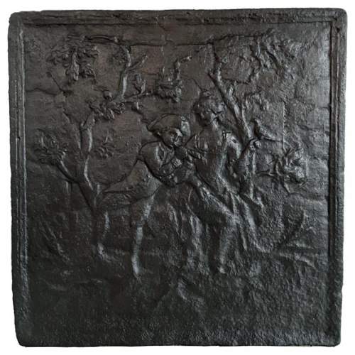 Cast iron fireback with gallant scene