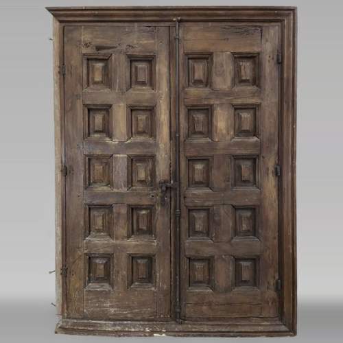 Double oak door with iron work