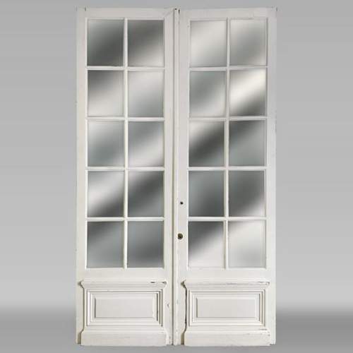 Double door in wood painted in white with mirror