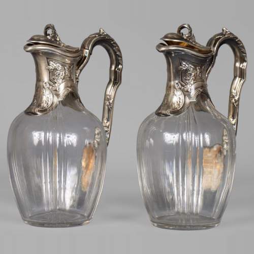 Beautiful pair of crystal and silver ewers