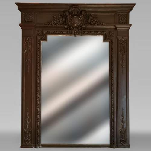 Napoleon III style trumeau with a cartouche in wood and stucco painted in brown