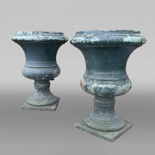Pair of Medici-form cast iron garden urns