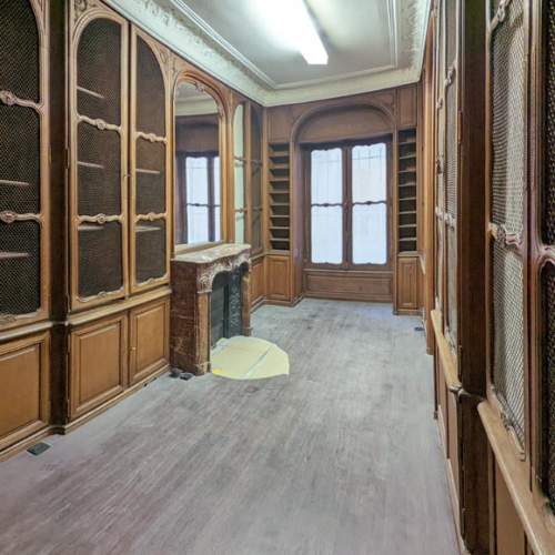 Louis XV style oak paneling and bookcase