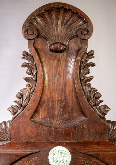 DECK Théodore (1823-1891), monumental oak mirror with green glazed faience medallions-2