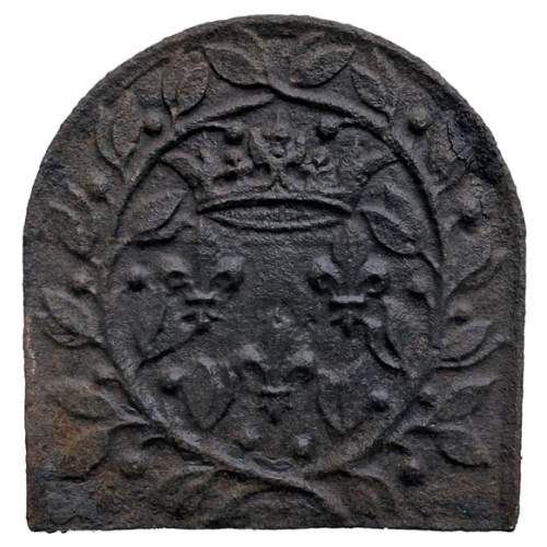 18th century fireback with three crowned lilies, symbols of the arms of France