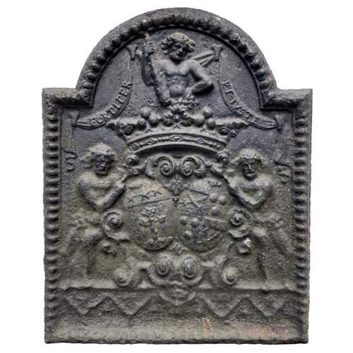 18th century fireback with two shields surrounded by three wild men