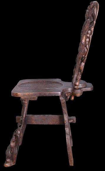 Group of sculpted wood chairs-4