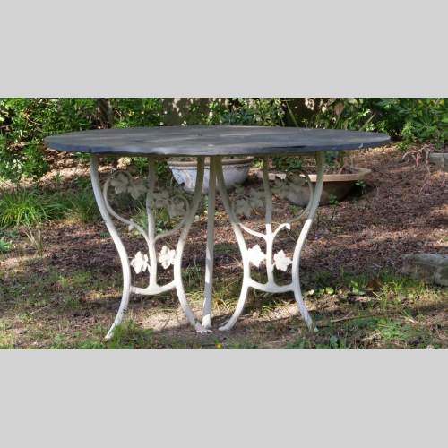 Cast iron garden table, late 20th century