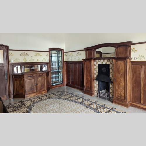 Art Nouveau style mahogany woodwork with fireplace