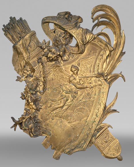 Union Centrale des Arts Décoratifs, decorative gilded bronze plaque in the form of a shield, featuring Winged Victory and trophies of arms Union Centrale des Arts Décoratifs, decorative gilded bronze plaque in the form of a shield, featuring Winged Victory and trophies of arms-0