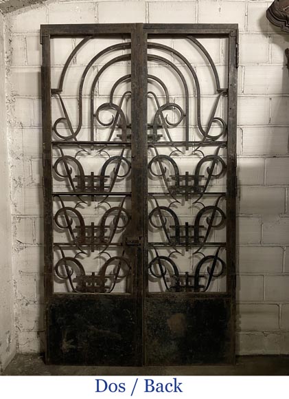 Double cast iron door with geometric decoration-1