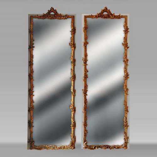 Pair of Napoleon III style mirrors decorated with garlands of flowers