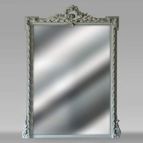 Louis XVI style trumeau richly decorated with a wreath of flowers