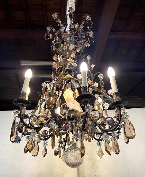 Patinated brass chandelier decorated with flowers and a polychrome porcelain parakeet-9