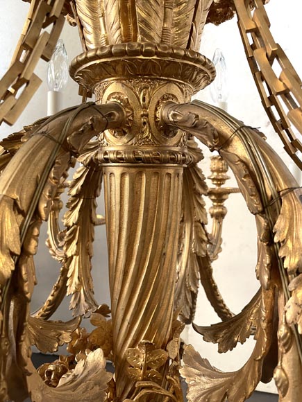 Louis XVI-style gilt-bronze chandelier with eighteen lights, featuring a garland of roses and a ribbon bow-6