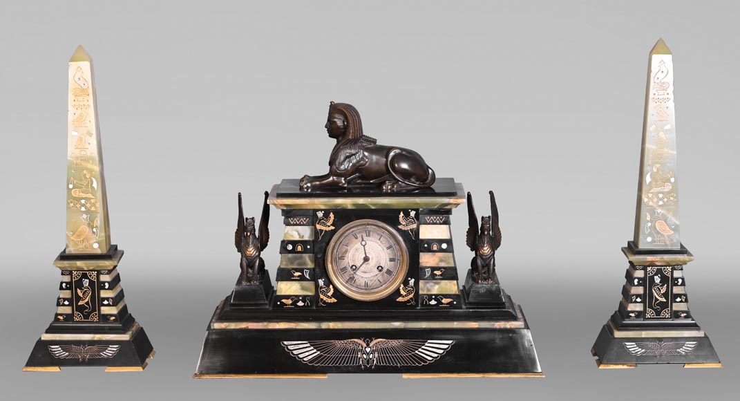 Egyptian Revival mantel garniture in black marble, green onyx, and gilt bronze-0