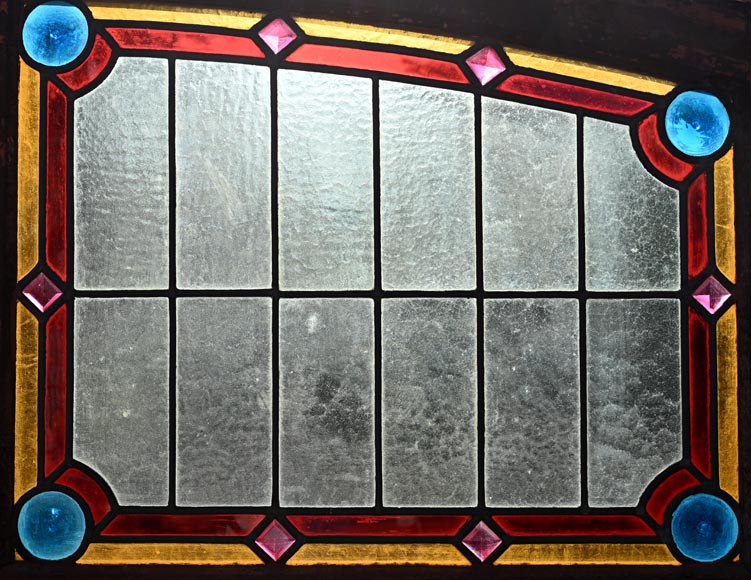 Double stained glass window in neo-Renaissance style depicting two figures with offerings-9