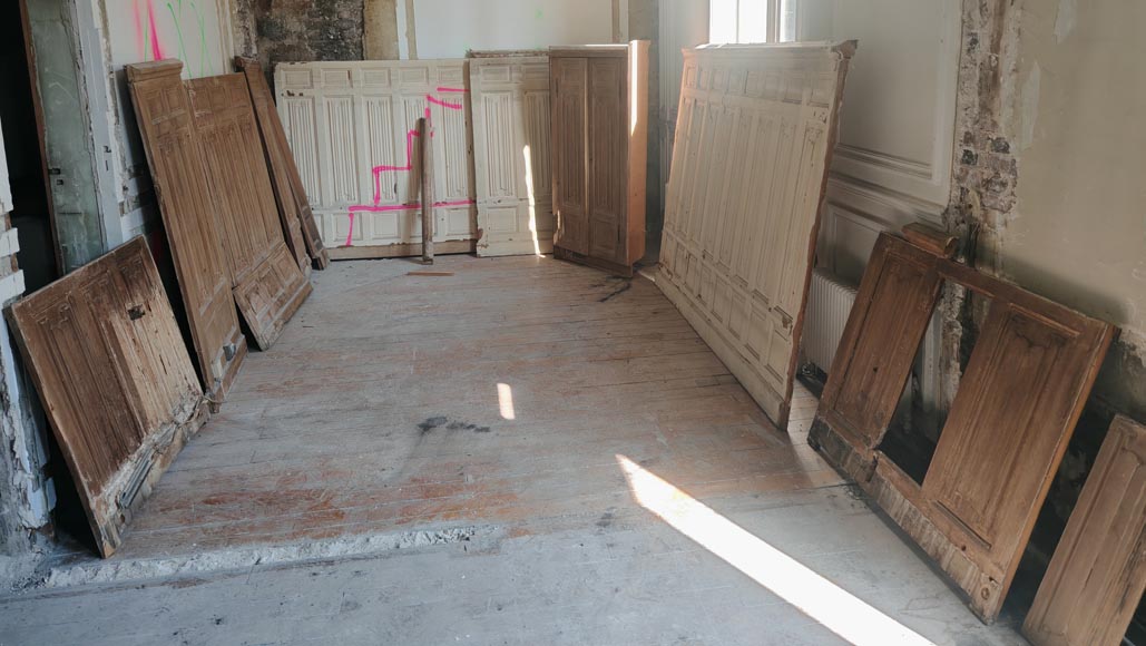 Neo-Gothic style oak wainscoting featuring a 