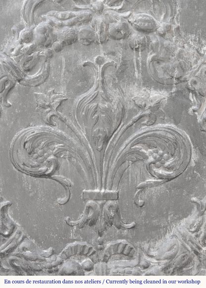 Napoleon III style fireback with a stylized fleur-de-lis, surrounded by a wreath of plants-1