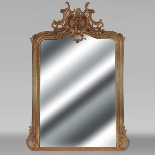 Napoleon III style gilded trumeau topped with a putto