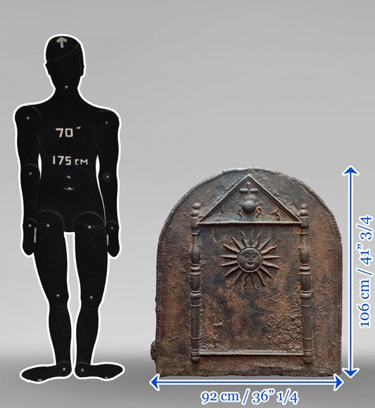 Cast iron fireback dated 1693, decorated with a radiant sun and architectural symbols-6