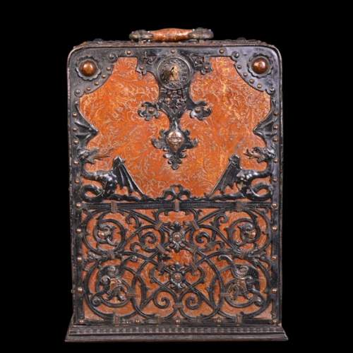 Leather and iron travelling case with dragons and mascarons