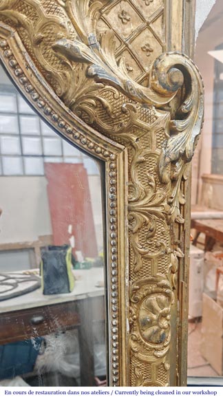 A richly gilded trumeau in the Napoleon III style, decorated with putti A richly gilded trumeau in the Napoleon III style, decorated with putti-7