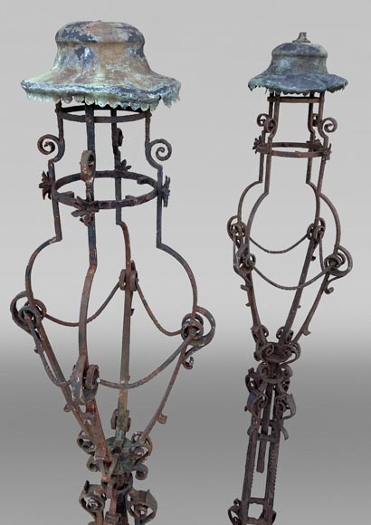 Pair of wrought iron lighting candelabra with openwork shafts, in the Renaissance taste-1